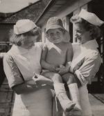 Nurses Holding a Child, Circa 1937 Nurses Holding a Child, Circa 1937