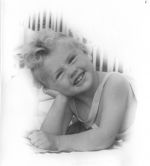 Close up shot of a child laying down with elbow supporting face smiling with braces around neck and chest posing for the camera. Playing in Bed, Circa 1955