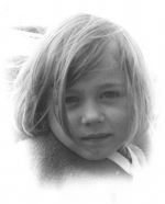 Close shot from the front of the face of a young child. Portrait of a Child, Circa 1955