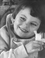A close up shot of a young child facing the camera. Portrait of a Child, Circa 1955