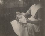Nurse Holding a Baby, Circa 1941 Nurse Holding a Baby, Circa 1941