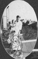 Staff Member Holding an Infant, Circa 1915 Staff Member Holding an Infant, Circa 1915