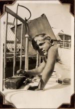 Medium shot of child laying down on a bed. Patient in Orthopaedic Cast, Circa 1941