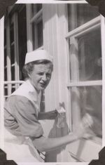 Nurse cleaning window, Circa 1943 Nurse cleaning window, Circa 1943