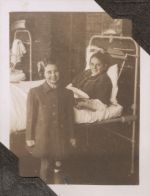 Two children, one in bed, Circa 1943 Two children, one in bed, Circa 1943
