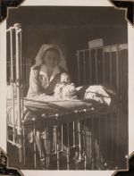 Nurse holding baby, Circa 1943 Nurse holding baby, Circa 1943