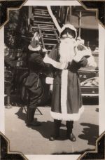 Father Christmas and fireman, Circa 1943 Father Christmas and fireman, Circa 1943