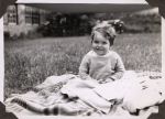 Infant in garden, Circa 1943 Infant in garden, Circa 1943