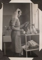 Nurse with medical equipment, Circa 1943 Nurse with medical equipment, Circa 1943