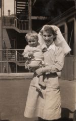 Nurse holding infant, Circa 1943 Nurse holding infant, Circa 1943