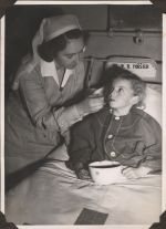 Nurse feeding child, Circa 1943 Nurse feeding child, Circa 1943