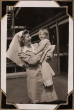 Nurse holding infant, Circa 1943 Nurse holding infant, Circa 1943