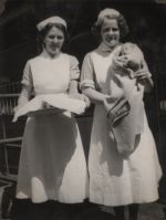 Two nurses with baby, Circa 1943 Two nurses with baby, Circa 1943