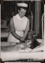 Nurse feeding patient, Circa 1943 Nurse feeding patient, Circa 1943