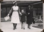Nurse and woman with child, Circa 1943 Nurse and woman with child, Circa 1943