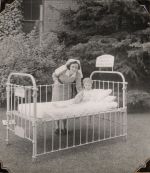 Nurse and infant in garden, Circa 1943 Nurse and infant in garden, Circa 1943