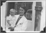 Doctor holding Infant, Circa 1943 Doctor holding Infant, Circa 1943