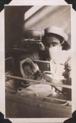 Nurse Holding a Small Child, Circa 1943 Nurse Holding a Small Child, Circa 1943