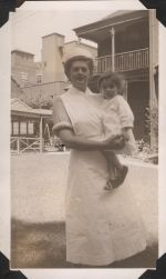 Nurse Holding Infant, Circa 1943 Nurse Holding Infant, Circa 1943