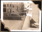 Long shot of multiple story hospital building and walkway. Women's Hospital, Circa 1946