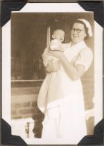 Nurse Holding a Baby, Circa 1940 Nurse Holding a Baby, Circa 1940