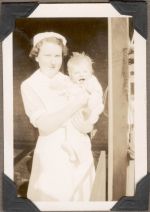 Nurse Holding a Baby, Circa 1940 Nurse Holding a Baby, Circa 1940