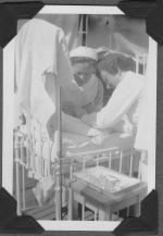 Nurses Treating a Child, Circa 1940 Nurses Treating a Child, Circa 1940