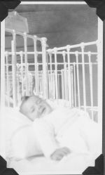 Infant in Bed, Circa 1940 Infant in Bed, Circa 1940