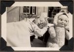 Infant and Doll, Circa 1942 Infant and Doll, Circa 1942