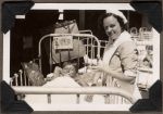 Nurse Checking on a Patient, Circa 1942 Nurse Checking on a Patient, Circa 1942
