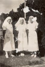 A long shot of a three Nurses standing outside in the garden in the sunshine. Three Nurses, 1928