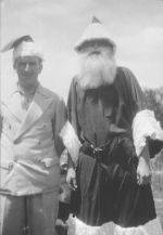 Medium shot of two men dressed as Father Christmas. Christmas Time, Circa 1940