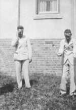 Long shot of two male medical staff outside. Looking for Water, Circa 1940