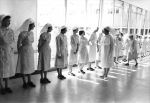 Staff patiently await the arrival of Queen Elizabeth II